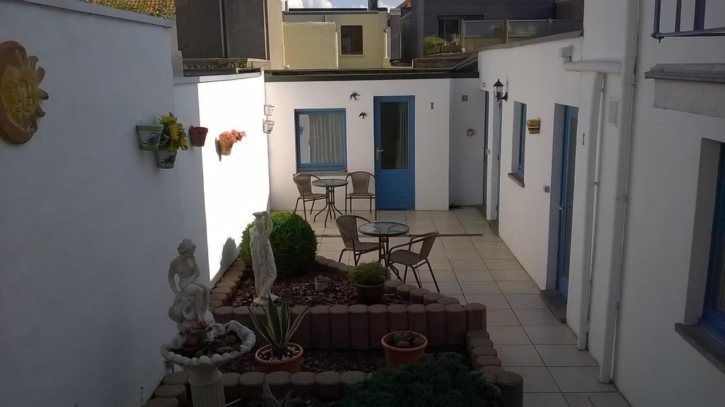 Kokodor Bed & Breakfast De Haan Bagian luar foto